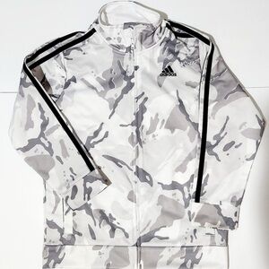 Adidas Essentials Camo Tricot Track Jacket in a gray camouflage pattern. Size-7